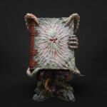 Limited edition Lovecraft collectible statue – Necronomicon book with tentacles and monstrous details.